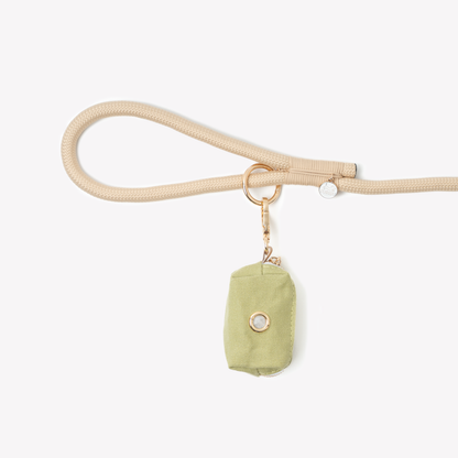 Green poop bag holder