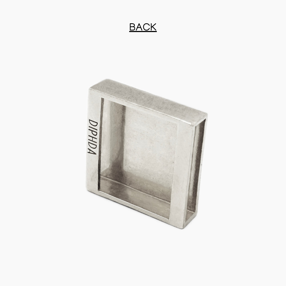 Back of silver finish moon slider charm