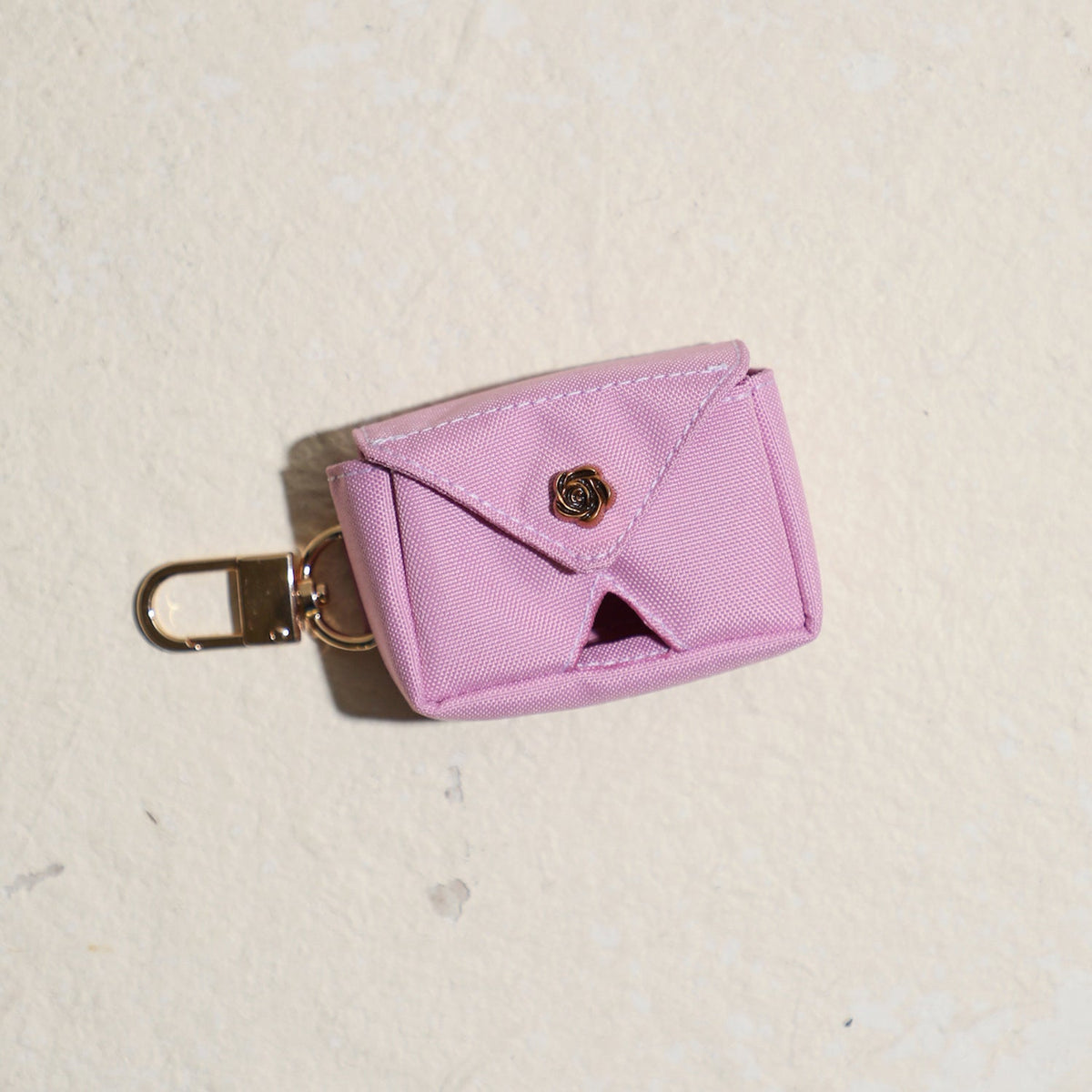 City Petit poo bag holder in pink, second view
